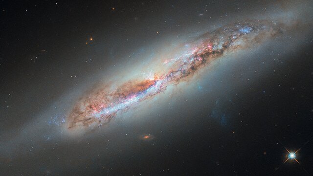 Discovering the Wonders of NGC 4388: A Spiral Galaxy’s Secrets